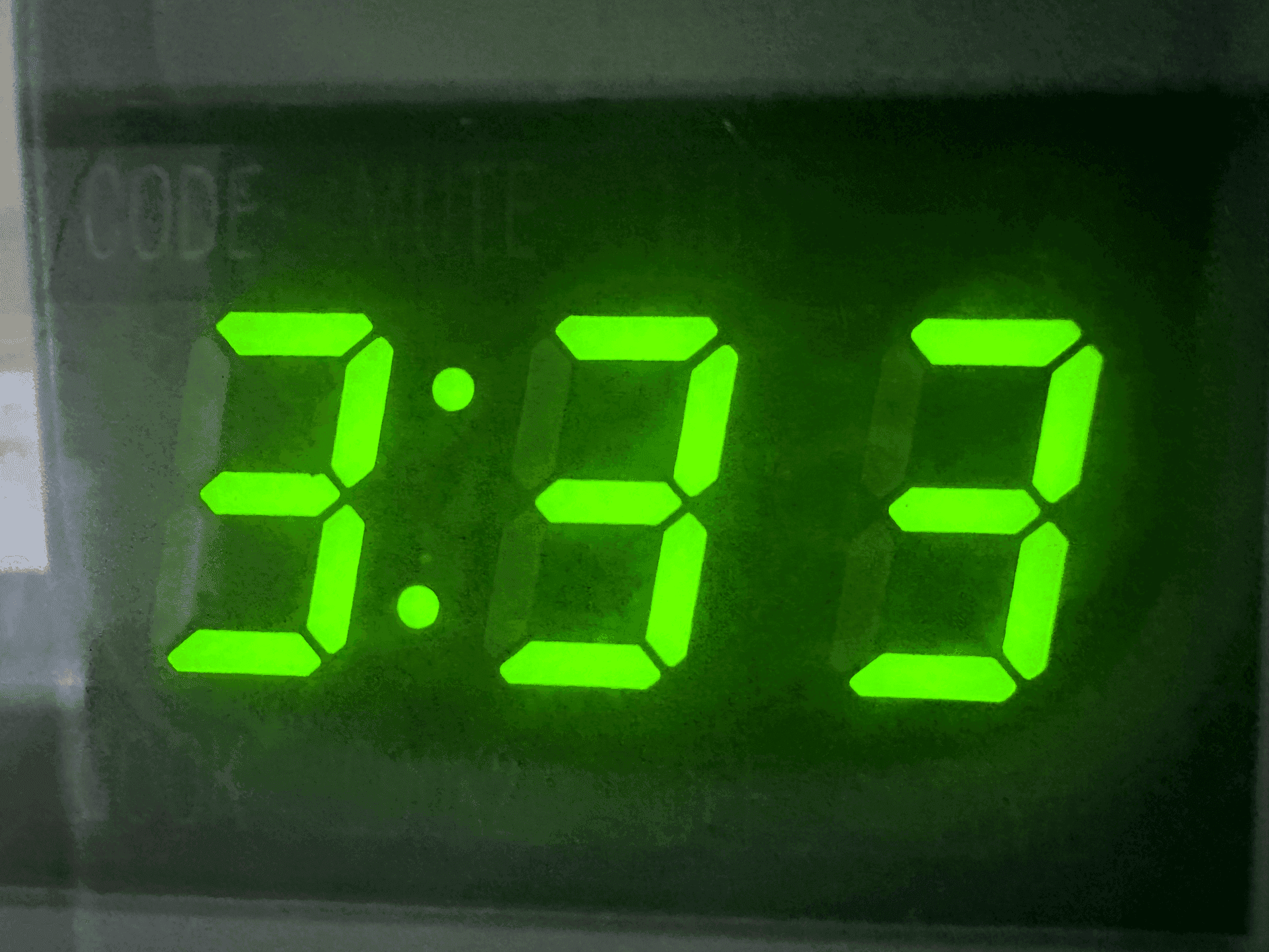 333 angel message on a clock